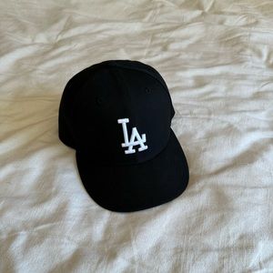 New Era black LA hat.